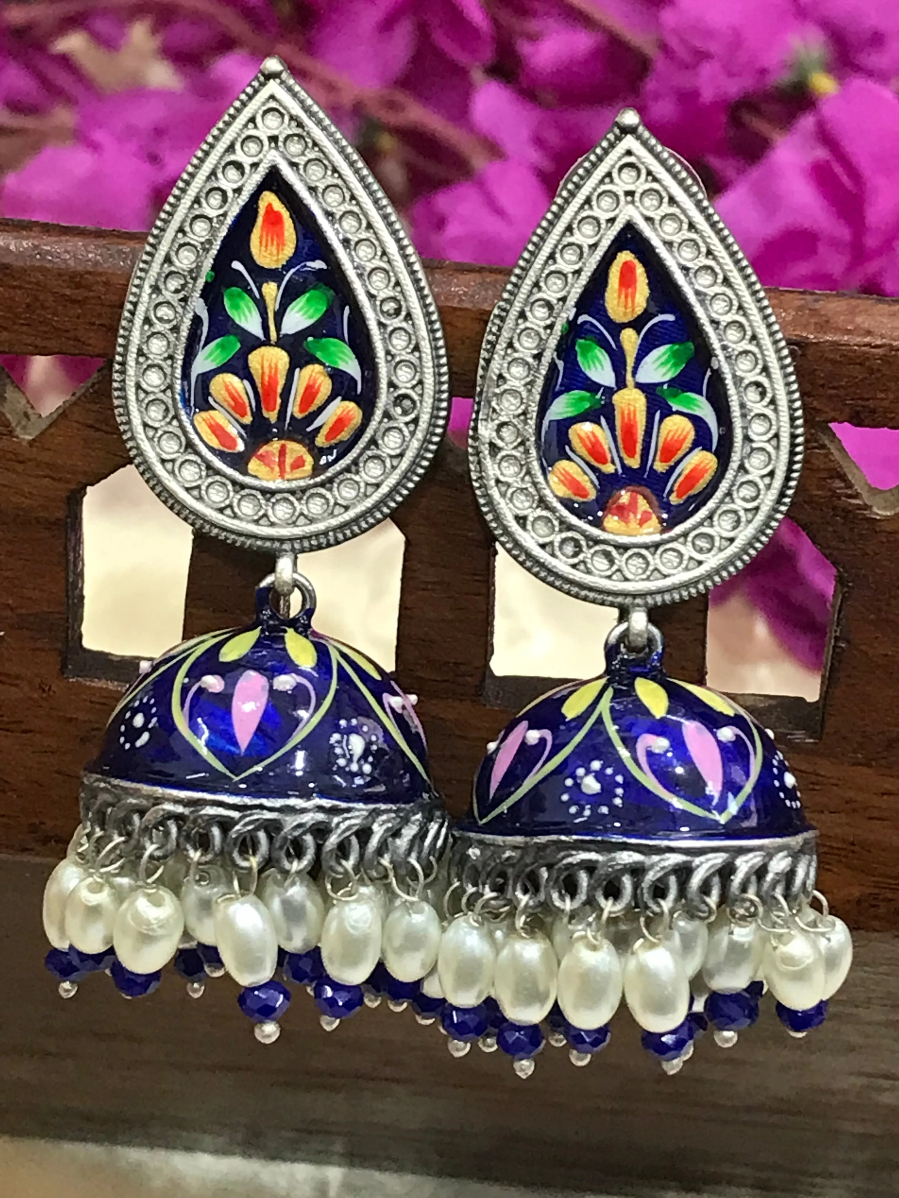 Attractive Blue Enameled Floral Design Silver Oxidized Jhumka Earrings With Pearl Drop