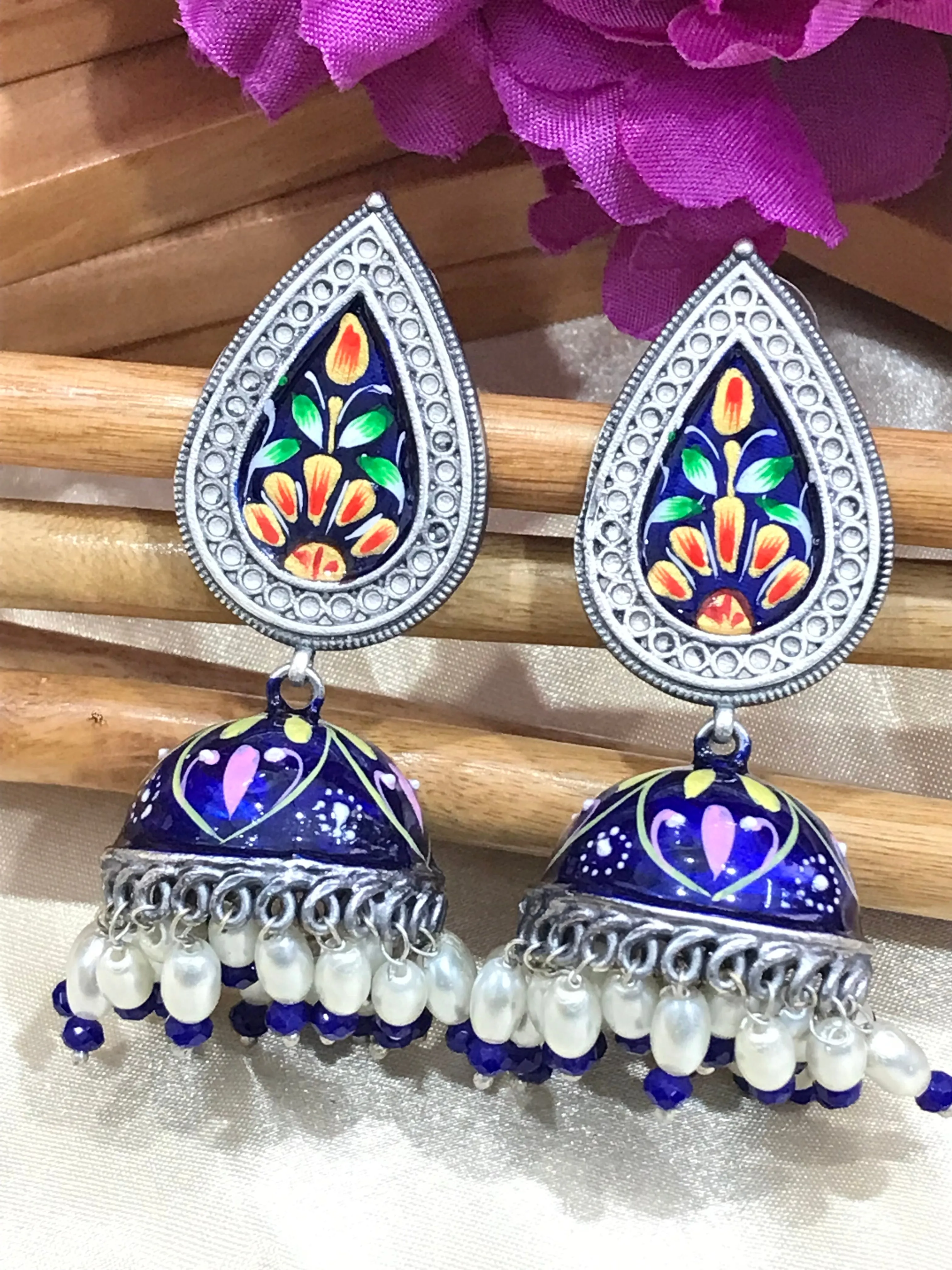 Attractive Blue Enameled Floral Design Silver Oxidized Jhumka Earrings With Pearl Drop